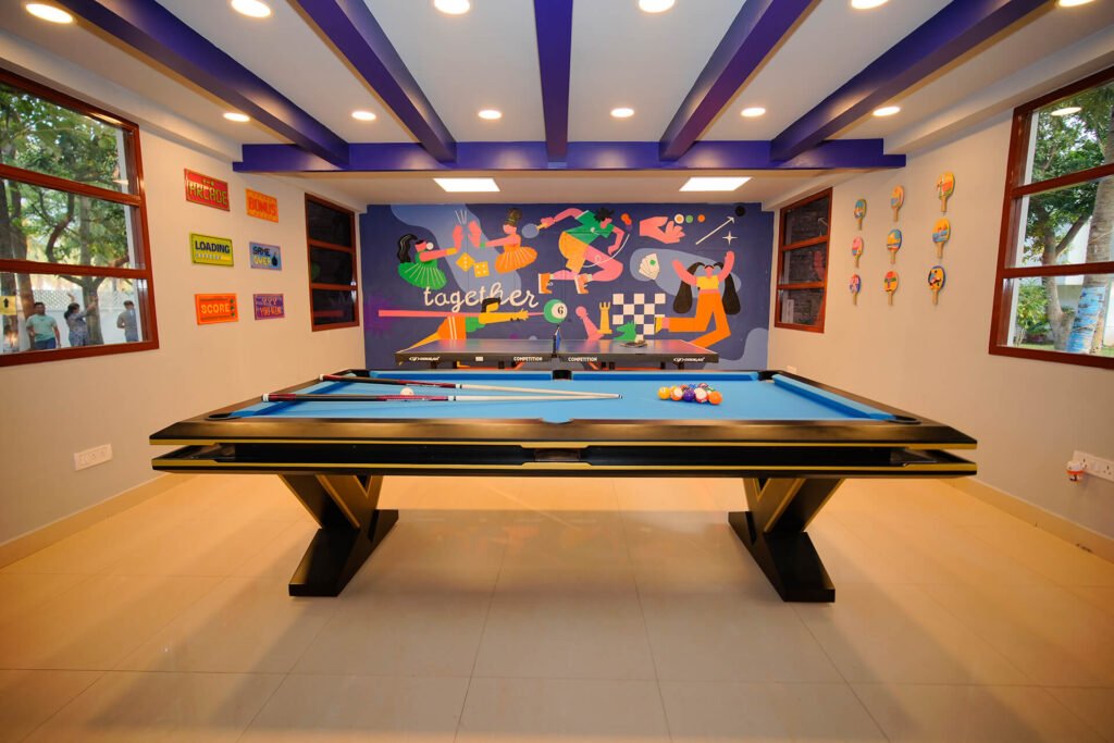 Indoor games room at Orchid Life clubhouse, Gunjur