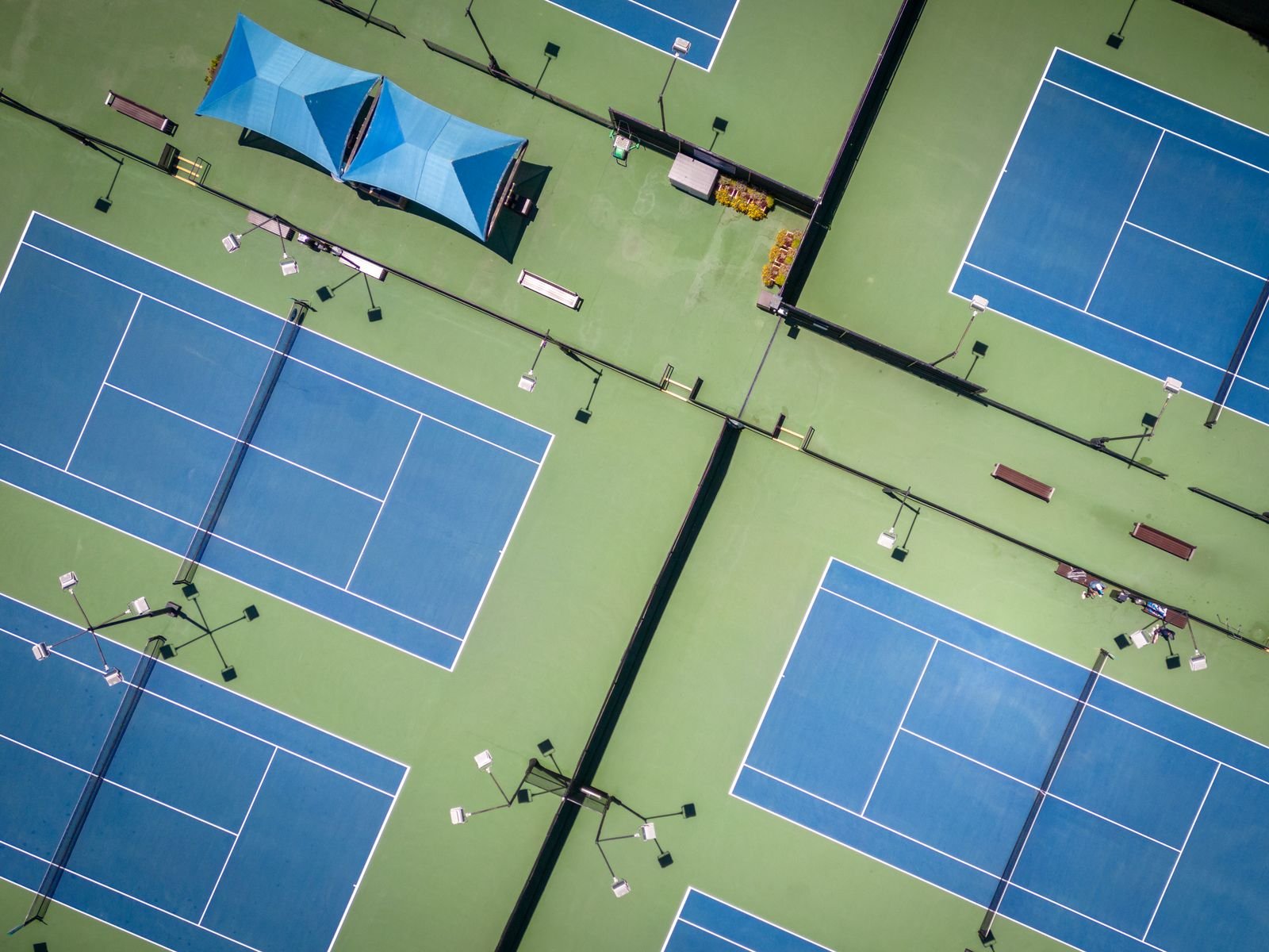 Tennis court at Orchid Life, Gunjur